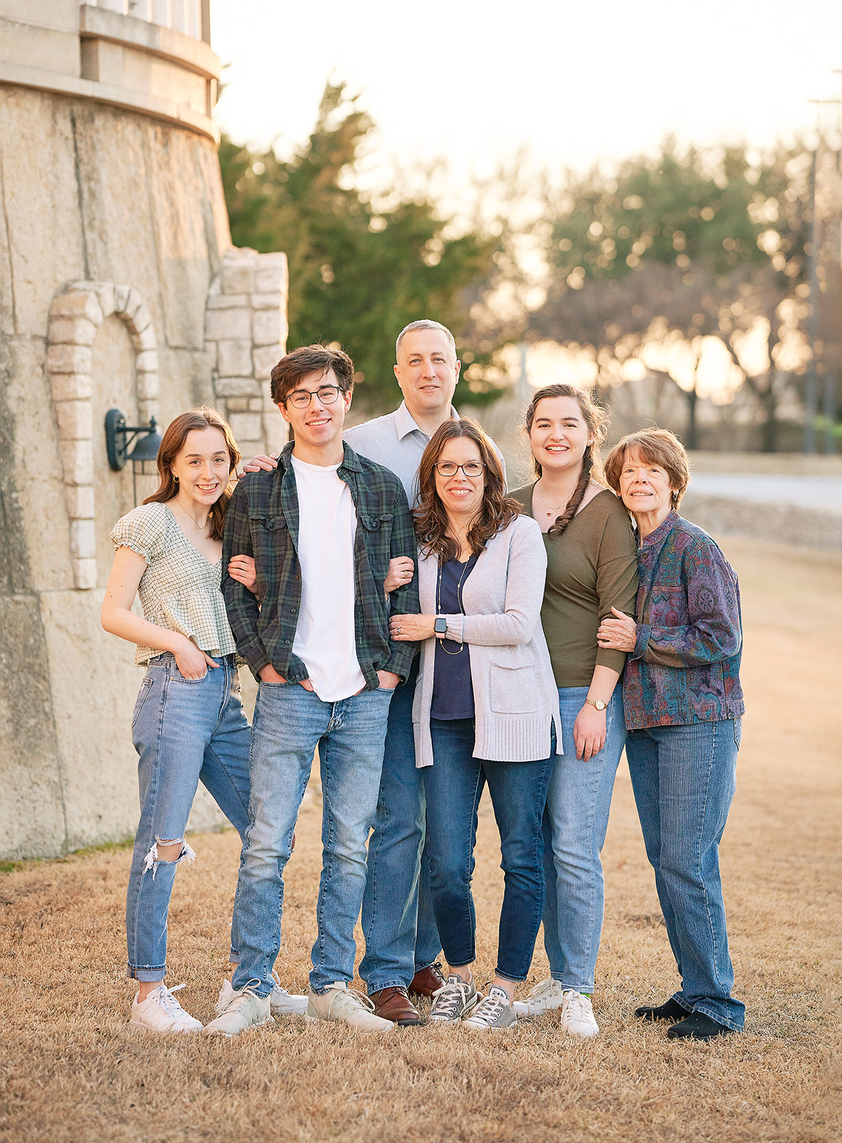 Family posing at Adriatica Village in McKinney, Texas