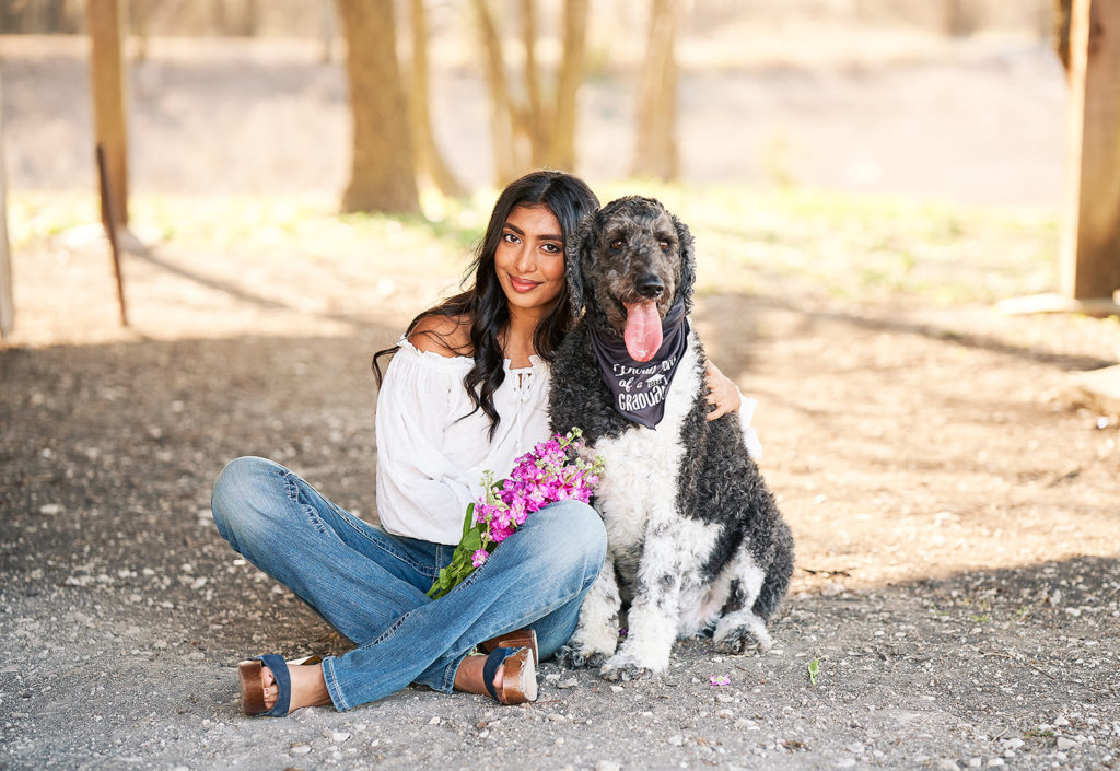 Hebron High school senior poses with dog for senior photos