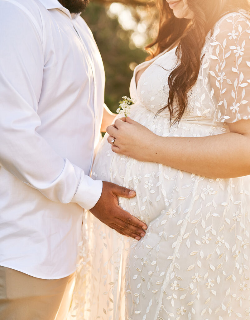 Dallas maternity session with a couple wearing white